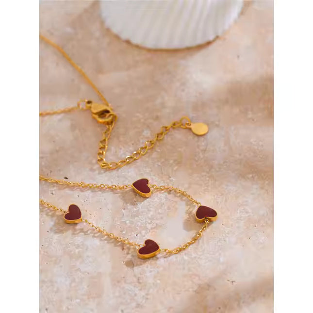 Eternal Love Necklace – A Chain of Hearts in Gold & Crimson